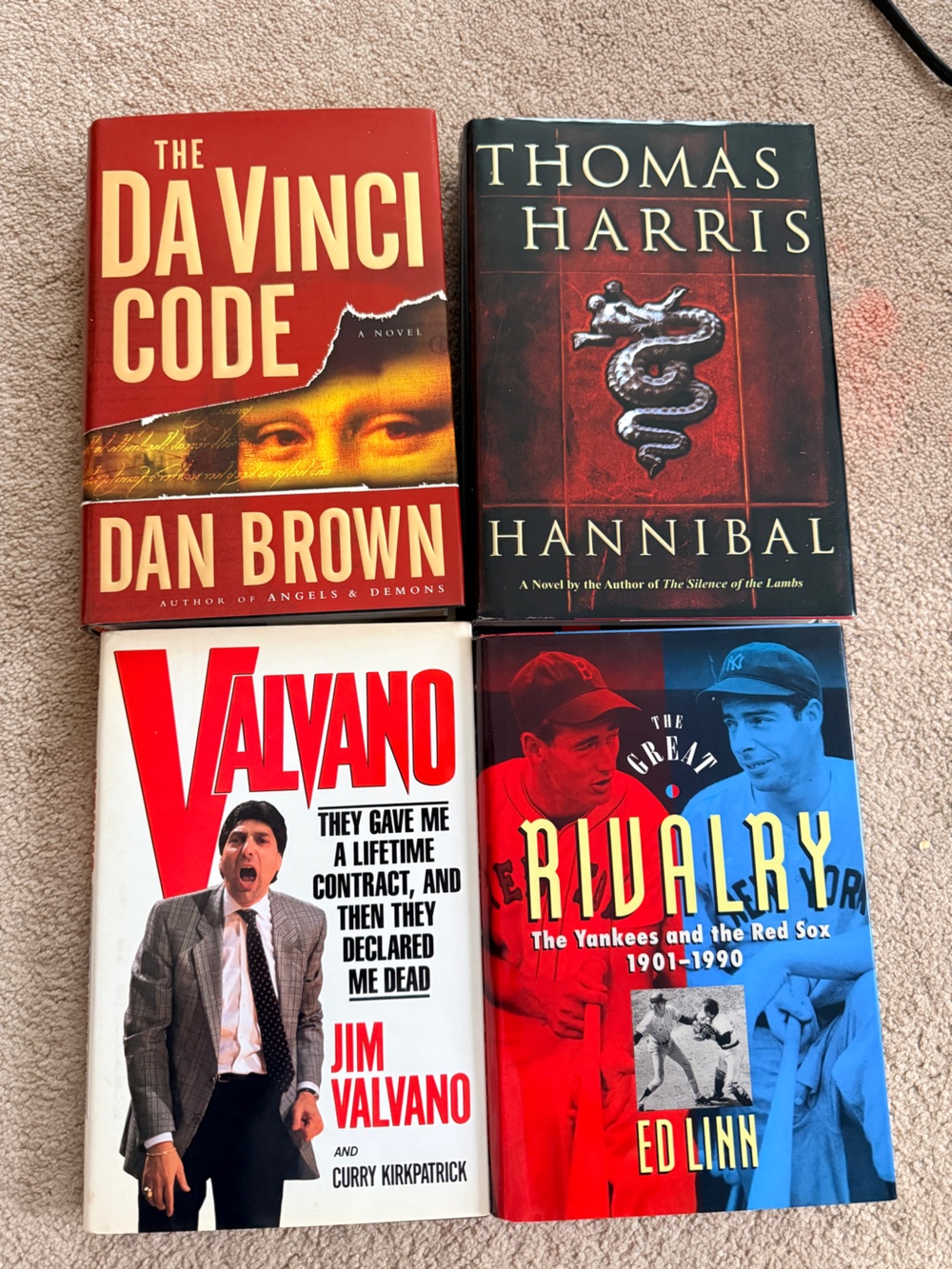 Set of 4 Hardcover Books with Red, Black, Blue & White Covers